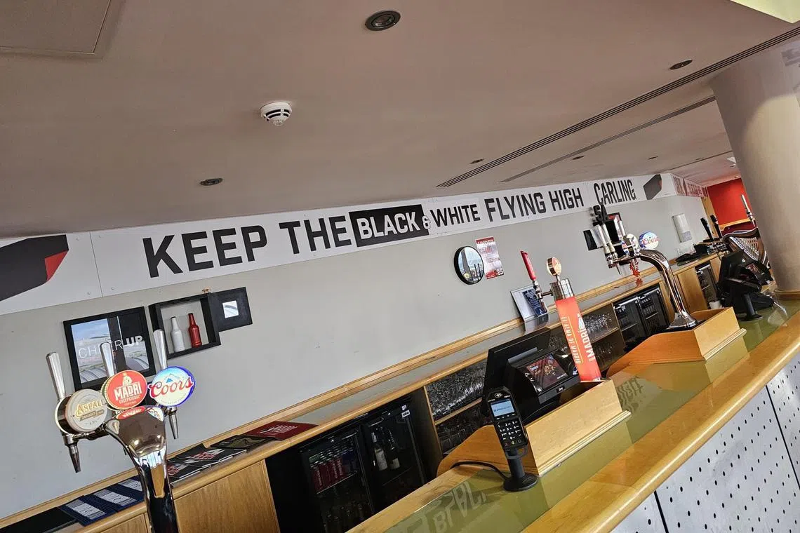 The bar used by away fans was plastered with signage proclaiming “We are United” and “Keep the Black and White flying high”.