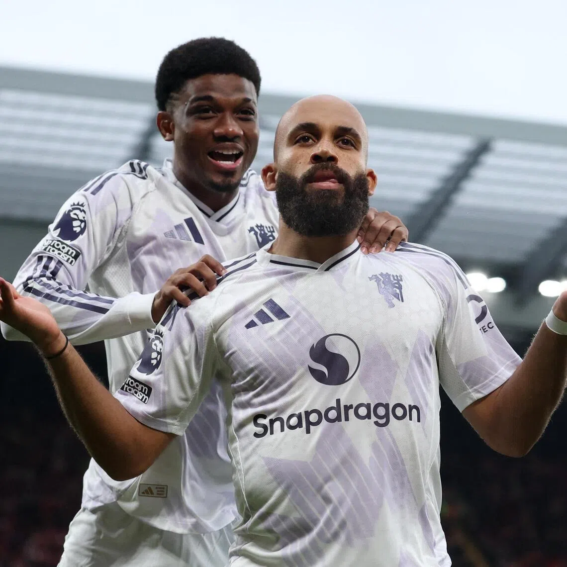 Africa Cup ‍of Nations-bound Amad Diallo (left) and Bryan Mbeumo have struck a good partnership on Manchester United's right wing.