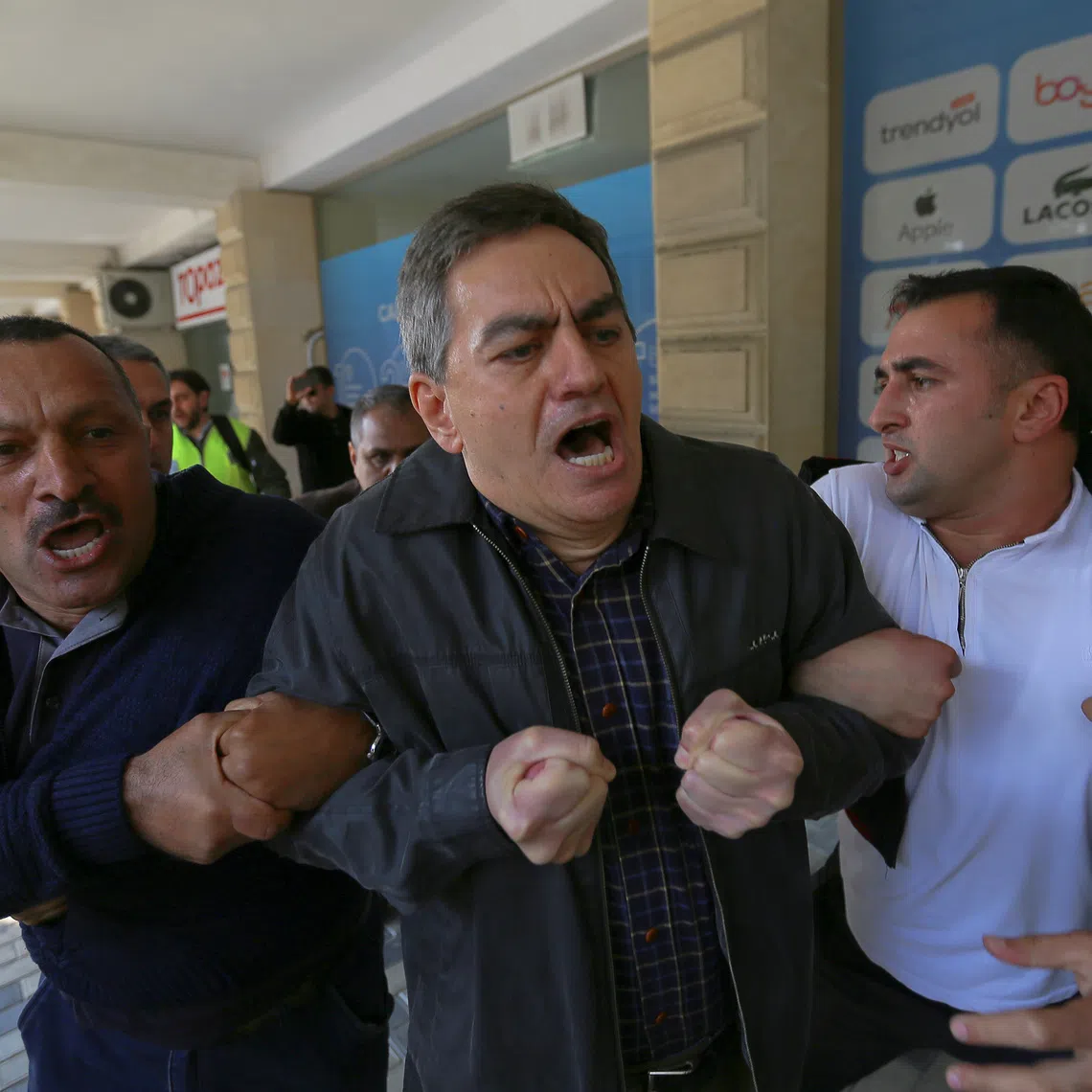 FILE PHOTO: Head of the Popular Front Party of Azerbaijan Ali Karimli and his supporters hold an unauthorized rally to demand the freedom of assembly in Baku, Azerbaijan October 19, 2019. REUTERS/Aziz Karimov/ File Photo