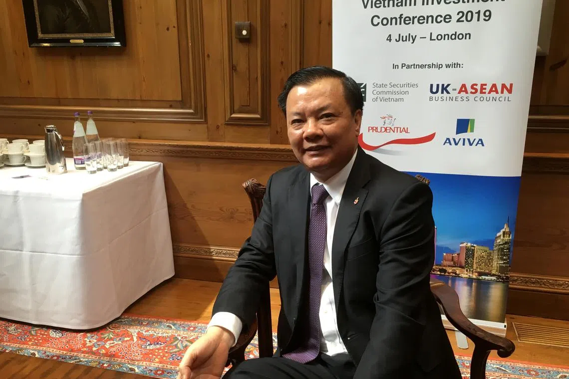 Vietnam finance minister Dinh Tien Dung speaks during an interview in London, Britain, July 4, 2019. REUTERS/Marc Jones/File Photo