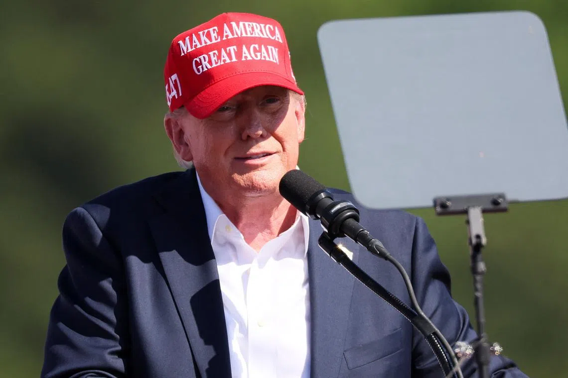 FILE PHOTO: Former U.S. President and Republican presidential candidate Donald Trump holds a campaign event, in Chesapeake, Virginia, U.S. June 28, 2024. REUTERS/Brendan McDermid/File Photo