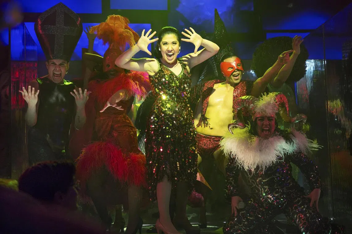 Ruthie Ann Miles as Imelda Marcos in the musical Here Lies Love, during its Public Theatre run in New York on April 30, 2014. The musical  will make its long-anticipated trip to Broadway this summer. 