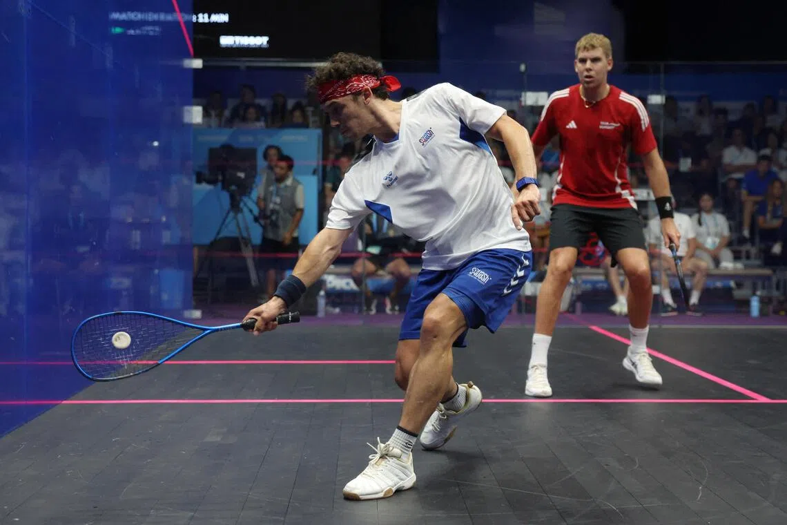 Eventual champion Victor Crouin (left) taking on Hungary's Balazs Farkas in the final of the men's singles squash event at the World Games in Chengdu in August.
