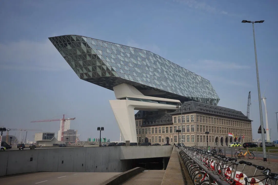 Port House Antwerp, the headquarters of the Port Authority of Port of Antwerp-Bruges, integrates a fire station from the 1920s with a modern superstructure.