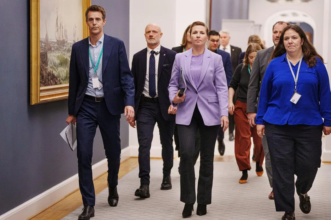 Denmark's Prime Minister Mette Frederiksen and Press and Communications Chief at the Prime Minister's Office Sophie Bremer arrive at the Foreign Policy Committee holding a meeting at Christiansborg in Copenhagen, Denmark,  January 16, 2025. Ritzau Scanpix/Liselotte Sabroe via REUTERS