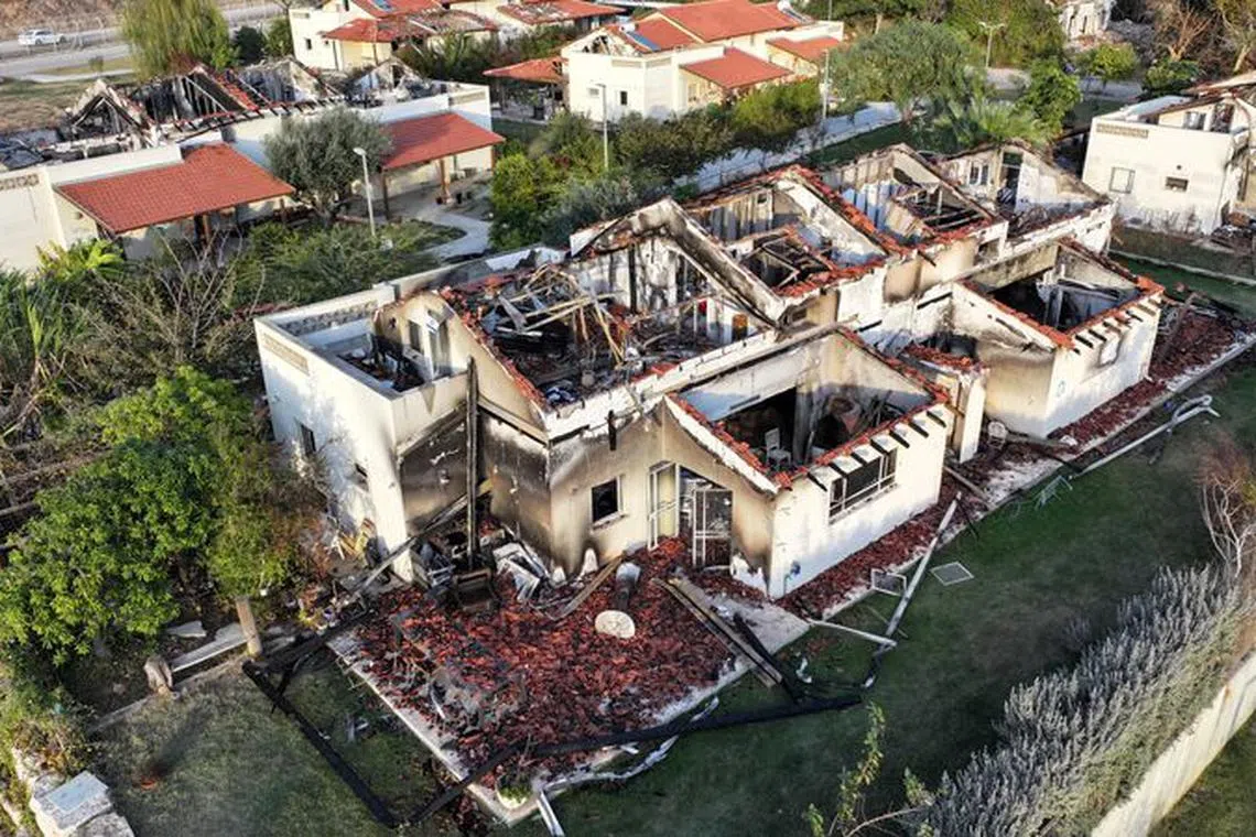FILE PHOTO: Damaged houses are seen, following the deadly October 7 attack by gunmen from Palestinian militant group Hamas from the Gaza Strip, in Kibbutz Beeri in southern Israel, November 28, 2023. REUTERS/Ilan Rosenberg