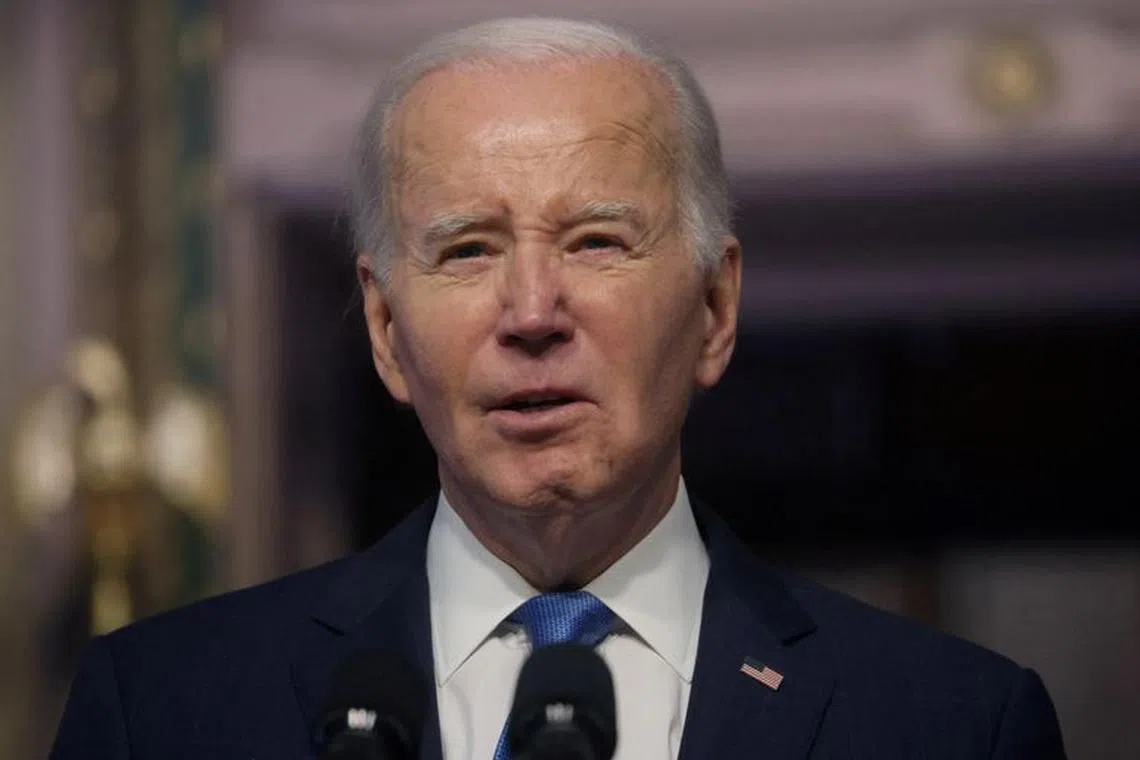 U.S. President Joe Biden delivers remarks during a meeting of the National Infrastructure Advisory Council the White House in Washington, U.S., December 13, 2023. REUTERS/Leah Millis/File Photo