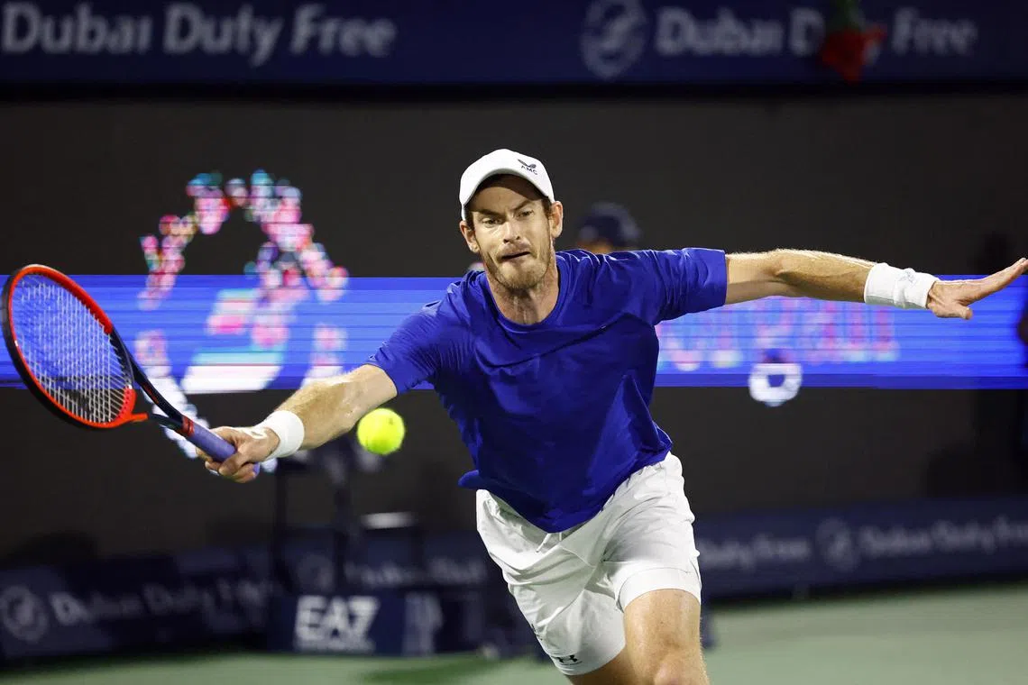Britain's Andy Murray hitting the ball against Canada's Denis Shapovalov in the first round of the Dubai Tennis Championships.