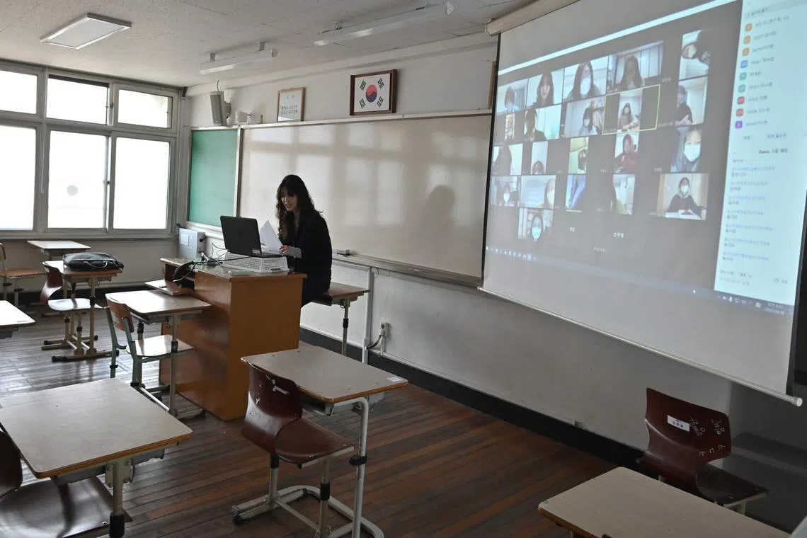 A teacher gives an online class at the Seoul Girls' High School on April 9, 2020.