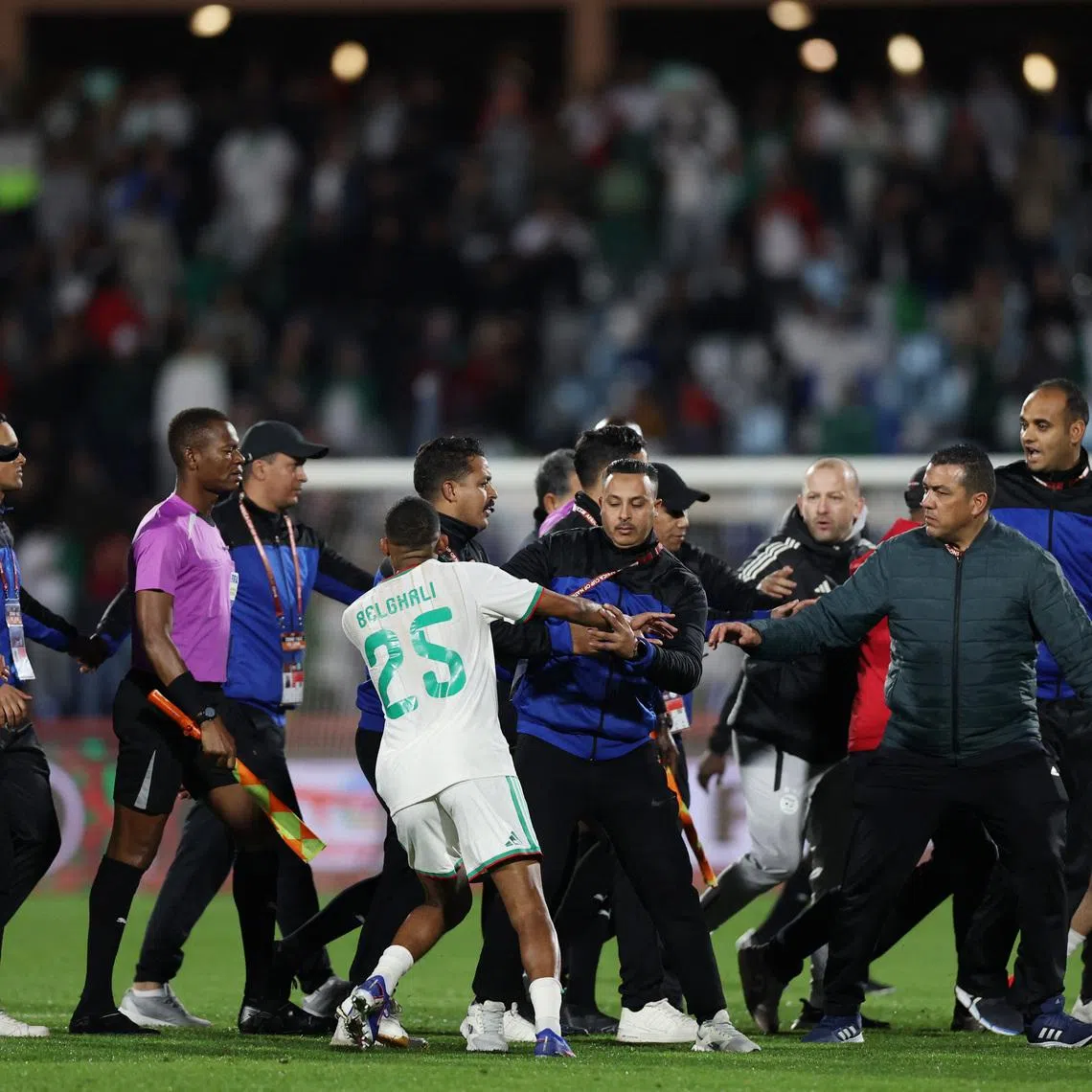 Soccer Football - CAF Africa Cup of Nations - Morocco 2025 - Quarter Final - Algeria v Nigeria - Grand Stadium of Marrakech, Marrakesh, Morocco - January 10, 2026 Algeria's Rafik Belghali clashes with match officials after the match REUTERS/Amr Abdallah Dalsh