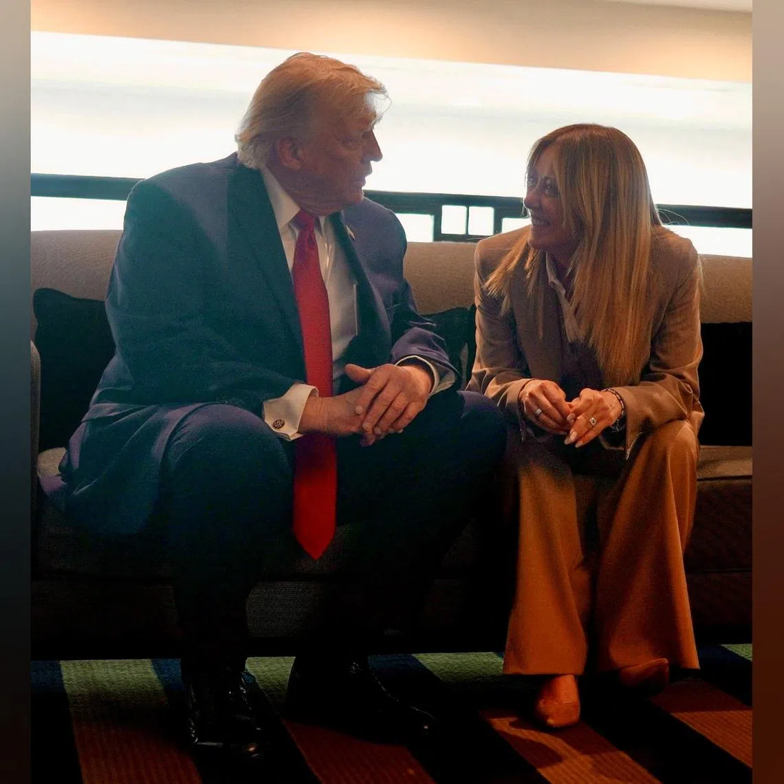 US President Donald Trump speaking to Italian Prime Minister Giorgia Meloni on the sidelines of the G-7 Summit in Evian-les-Bains, France.