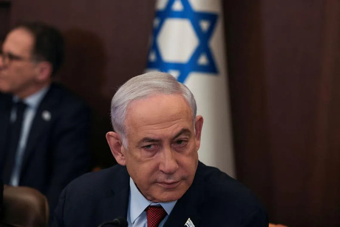Israeli Prime Minister Benjamin Netanyahu attends the weekly cabinet meeting at the Prime Minister's office in Jerusalem, December 10, 2023 REUTERS/Ronen Zvulun/Pool/File Photo