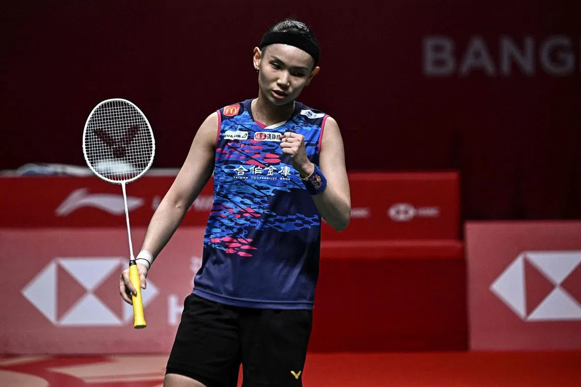 Taiwan’s Tai Tzu-ying reacts after a point against China’s He Bingjiao during their women’s singles semi-final match at the HSBC BWF World Tour Finals badminton tournament in Bangkok on December 10, 2022. (Photo by Lillian SUWANRUMPHA / AFP)