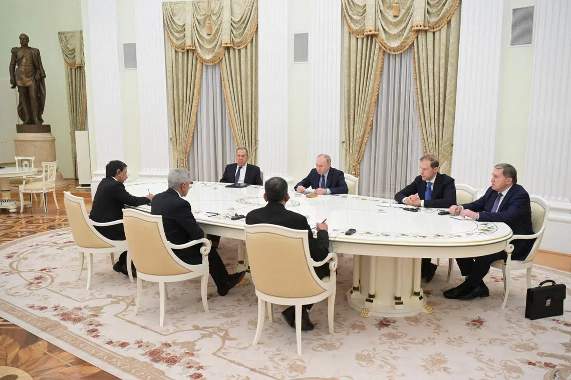 Russia's President Vladimir Putin (centre) attends a meeting with India's Foreign Minister Subrahmanyam Jaishankar (2nd left) in Moscow on Dec 27, 2023. 