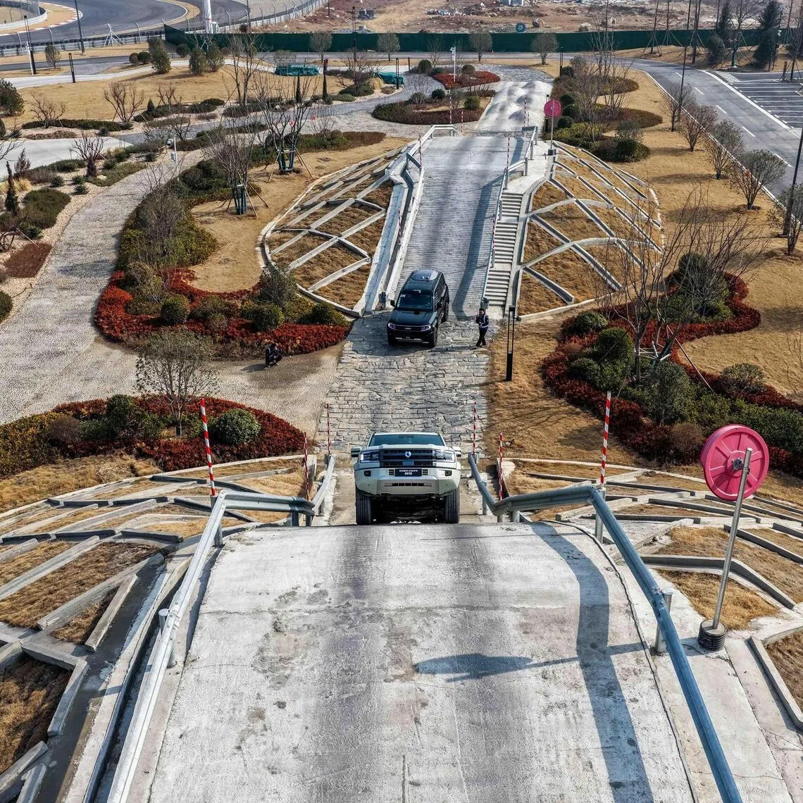 The off-road terrain course is designed to show off Denza's rugged capabilities.