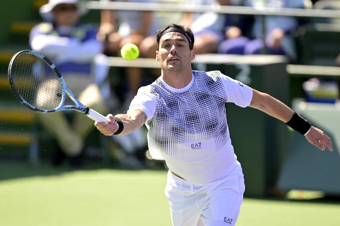 FILE PHOTO: Mar 3, 2025; Indian Wells, CA, USA;  Fabio Fognini (ITA) hits a shot against Colton Smith (not pictured) during his qualifying match in the BNP Paribas open at the Indian Well Tennis Garden. Mandatory Credit: Jayne Kamin-Oncea-Imagn Images/File Photo