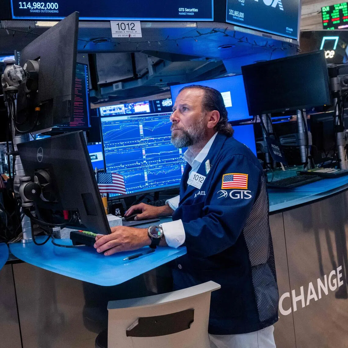 Traders working on the floor of the New York Stock Exchange on Aug 6, in New York City.