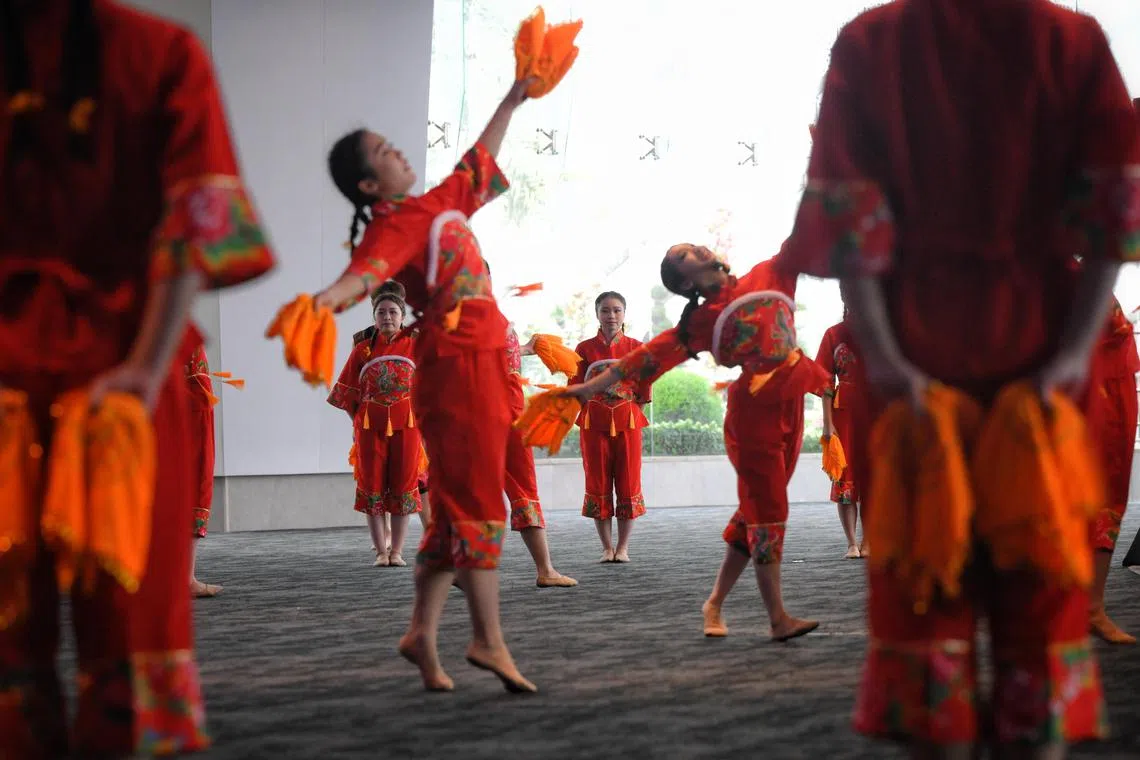 Performers from the dance department of the National Taiwan University of Physical Education and Sport perform during the media preview for the overseas cultural performances at River Hongbao 2024, held at Gardens by the Bay on Feb 7, 2024. Their piece, titled “Welcome the Arrival of Spring with Hankerchiefs” uses traditional Chinese humanistic features such as calligraphy and ink brushstrokes.