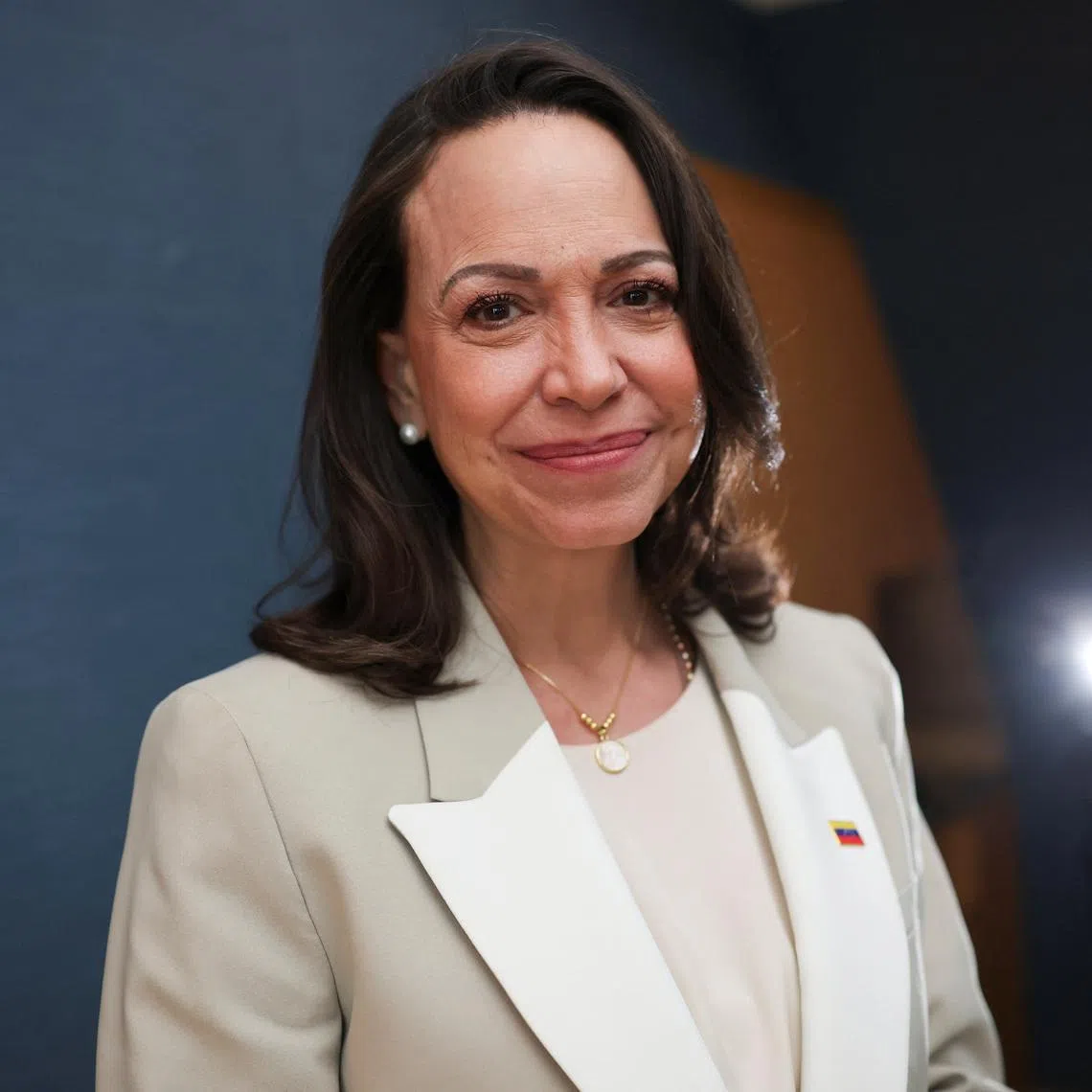 Venezuelan opposition leader Maria Corina Machado poses for a photograph during an interview with Reuters in Madrid, Spain, April 19, 2026. REUTERS/Isabel Infantes