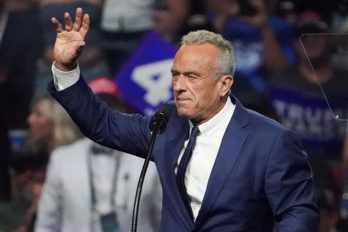 FILE PHOTO: Former independent presidential candidate Robert F. Kennedy Jr. gestures during Republican presidential nominee and former U.S. President Donald Trump's rally in Glendale, Arizona, U.S., August 23, 2024. REUTERS/Go Nakamura/File Photo