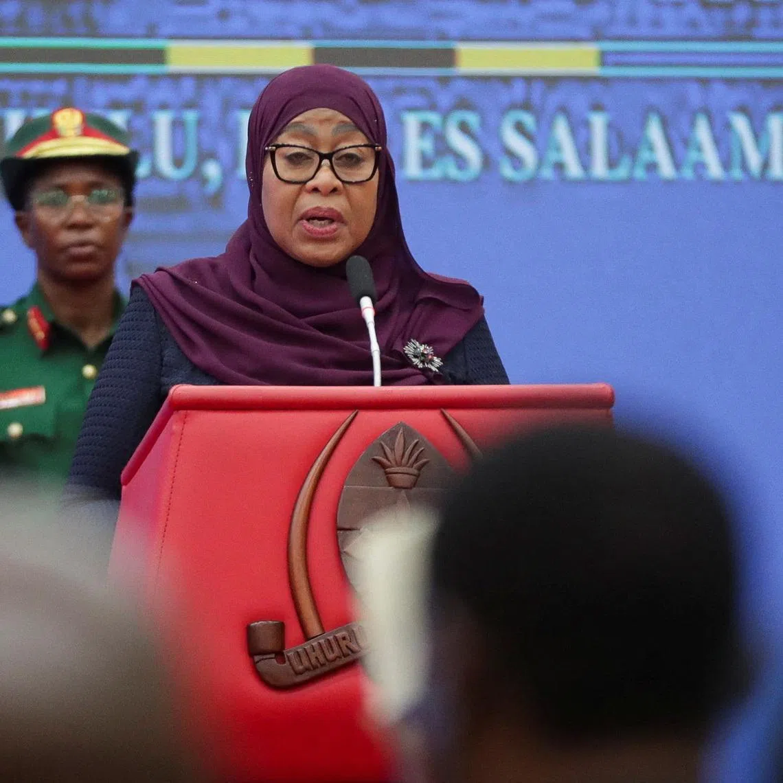 Tanzania's President Samia Suluhu Hassan addresses delegates after receiving the report by the Presidential Commission of Inquiry into violence that erupted during and after Tanzania’s October 29, 2025, General Election at the State House in Dar es Salaam, Tanzania, April 23, 2026. REUTERS/Emmanuel Herman