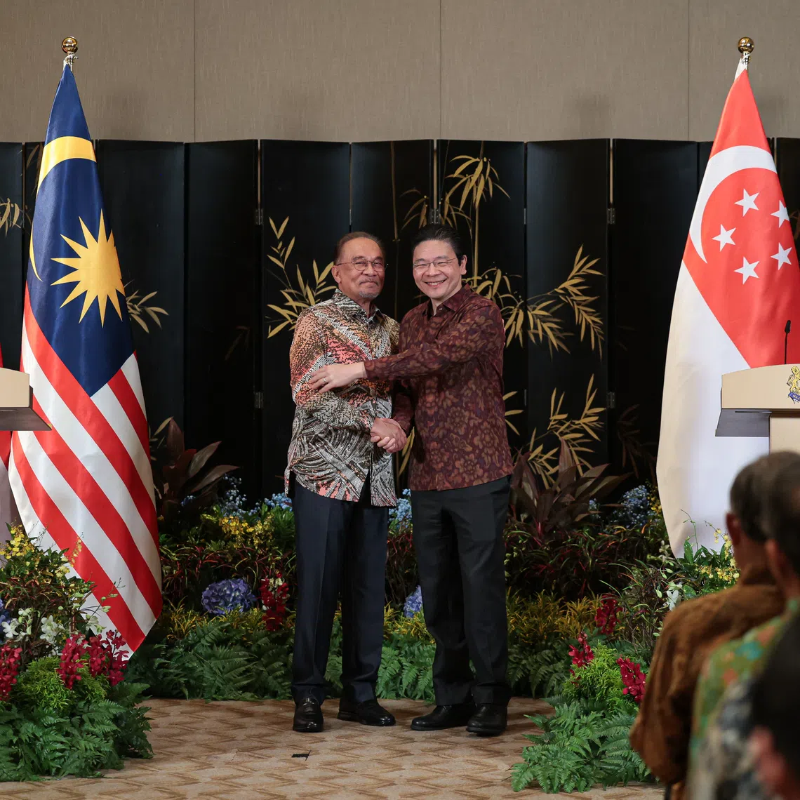 Prime Minister Lawrence Wong with Malaysian Prime Minister Anwar Ibrahim at the 12th Singapore- Malaysia Leaders’ Retreat in Singapore on Dec 4. 