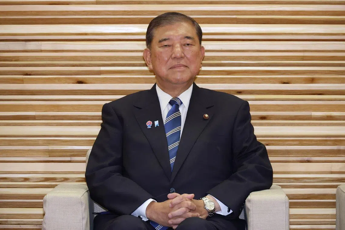 Japan's Prime Minister Shigeru Ishiba attends a cabinet meeting at the prime minister's office in Tokyo on July 22, 2025. (Photo by JIJI Press / AFP) / Japan OUT