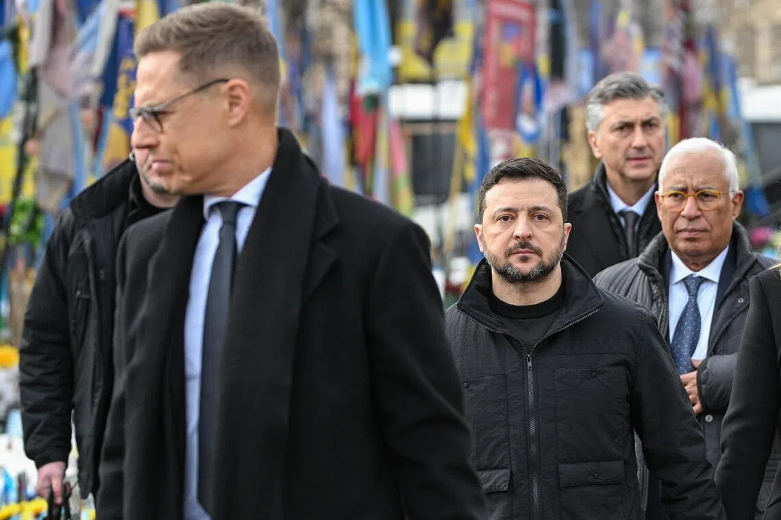Ukrainian President Volodymyr Zelensky (centre) and EU Council president Antonio Costa (far right), together with other world leaders, taking part in a ceremony in Kyiv on Feb 24 marking the fourth anniversary since Russia's full-scale invasion of Ukraine.