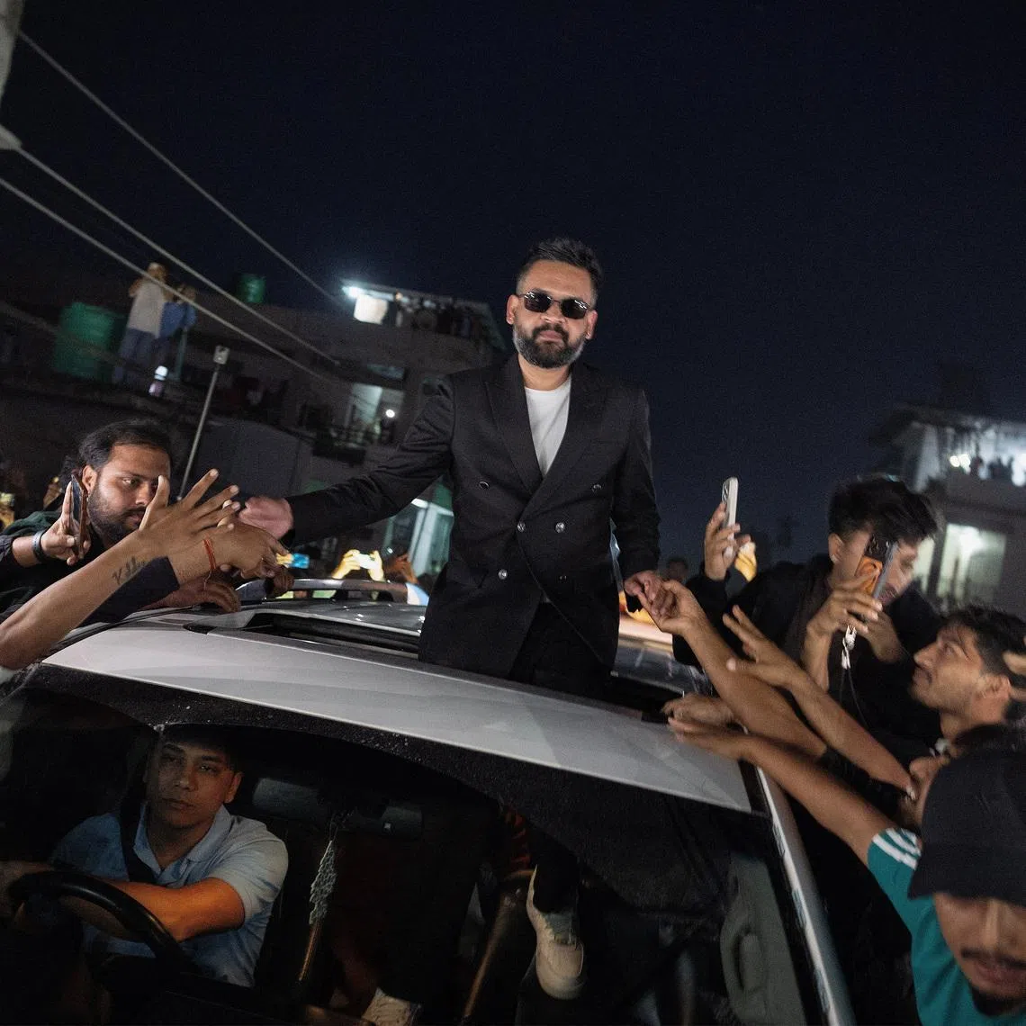 Balendra Shah, a rapper-turned-politician and the prime ministerial candidate for RSP, celebrates with his supporters after winning the election, in Damak, Jhapa district, Nepal, March 7, 2026. REUTERS/Adnan Abidi
