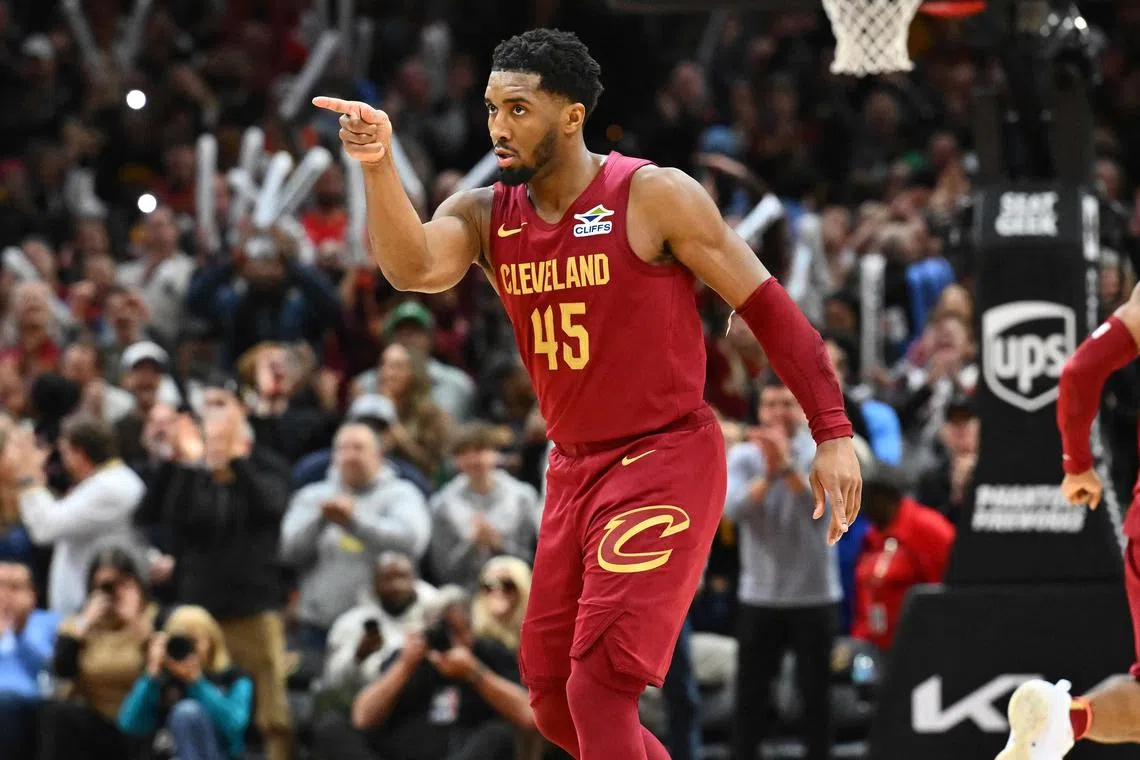 Donovan Mitchell of the Cleveland Cavaliers celebrating during the fourth quarter of his team's 115-111 National Basketball Association win over the Boston Celtics at Rocket Mortgage Fieldhouse on Dec 1 in Ohio.