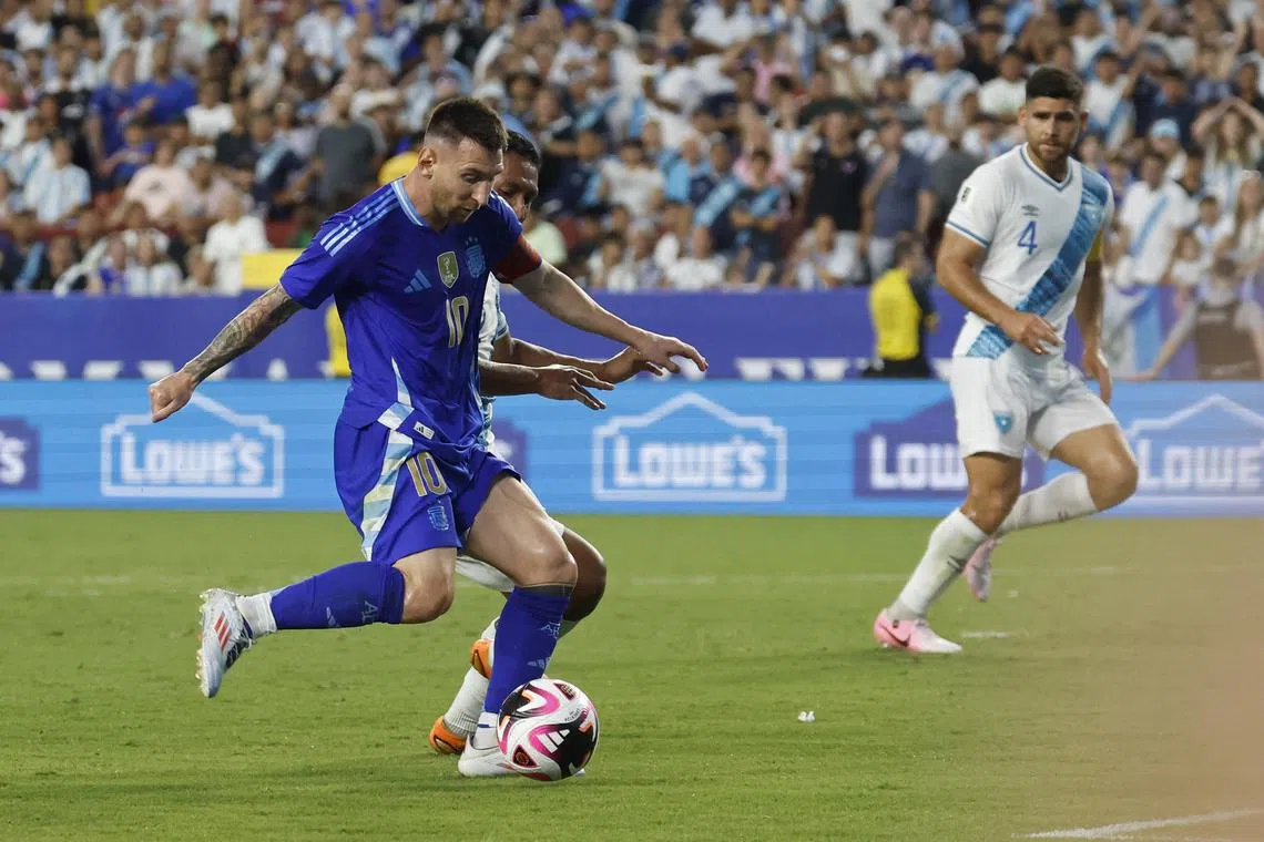 Jun 14, 2024; Landover, Maryland, USA; Argentina forward Lionel Messi (10) shoots the ball against Guatemala in the first half at Commanders Field. Mandatory Credit: Geoff Burke-USA TODAY Sports
