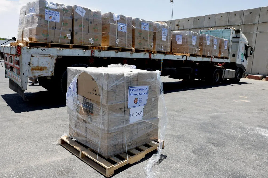 FILE PHOTO: An Egyptian truck carrying humanitarian aid for the Gaza Strip, amid the ongoing conflict in Gaza between Israel and the Palestinian Islamist group Hamas, is seen at the Kerem Shalom crossing in southern Israel, May 30, 2024. REUTERS/Amir Cohen/File Photo