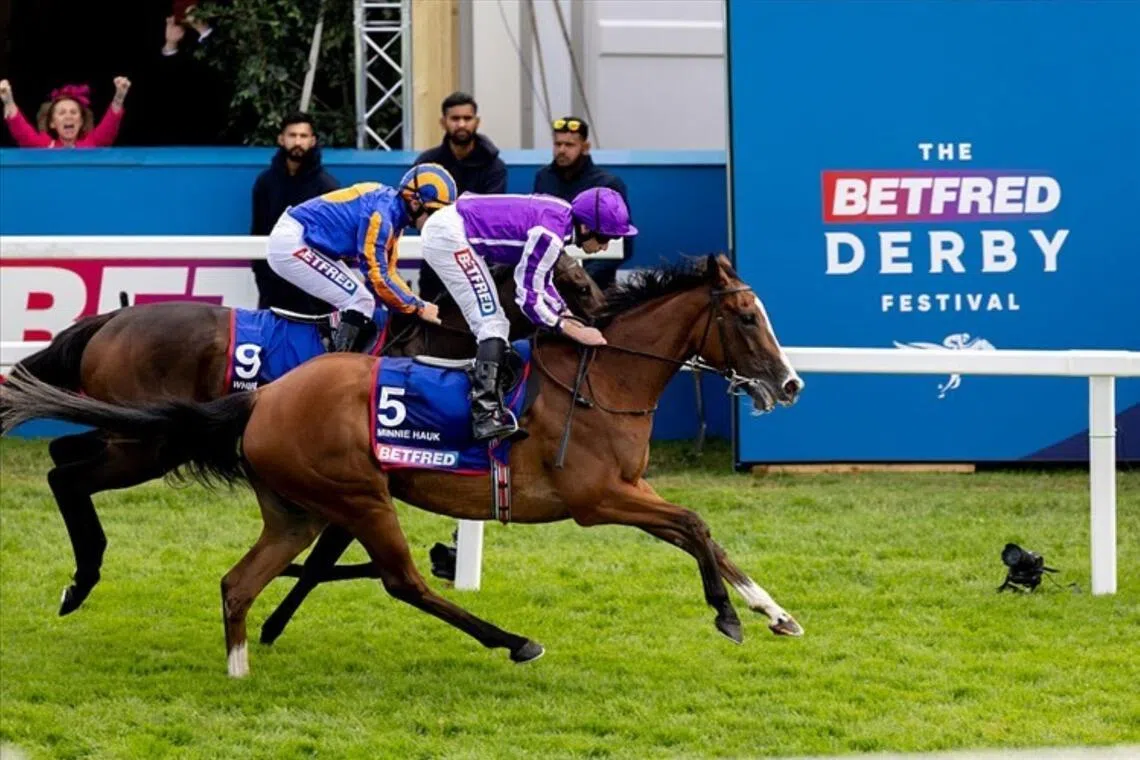 Horse racing: Minnie Hauk (Ryan Moore) outslugging stablemate Whirl (Wayne Lordan) in the Group 1 Epsom Oaks (2,400m), 6 June 2025.