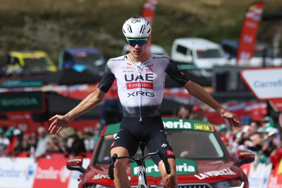 Cycling - Vuelta a Espana - Stage 7 - Andorra la Vella to Cerler - Andorra la Vella, Andorra - August 29, 2025 UAE Team Emirates XRG's Juan Ayuso celebrates winning stage 7 REUTERS/Bruna Casas
