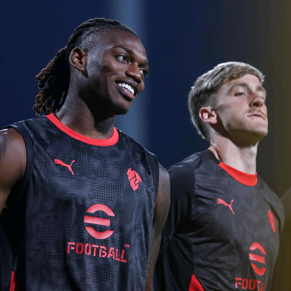 AC Milan forward Rafael Leao alongside his teammate Alexis Saelemaekers during their training session at Bishan Stadium on July 22, 2025. Leao was named Serie A MVP in the 2021-22 season.
