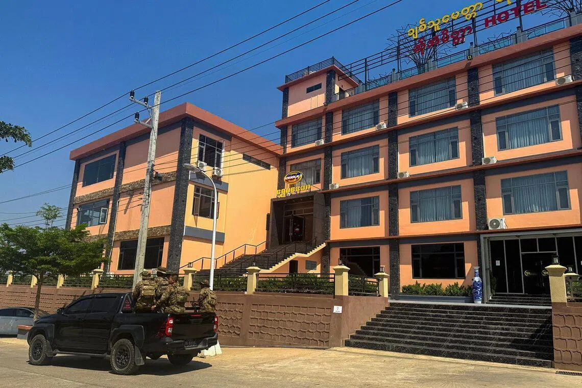 Members of the Karen Border Guard Force patrol during a crackdown operation on illicit activity linked to scam centres in Shwe Kokko in Myanmar's eastern Myawaddy township.