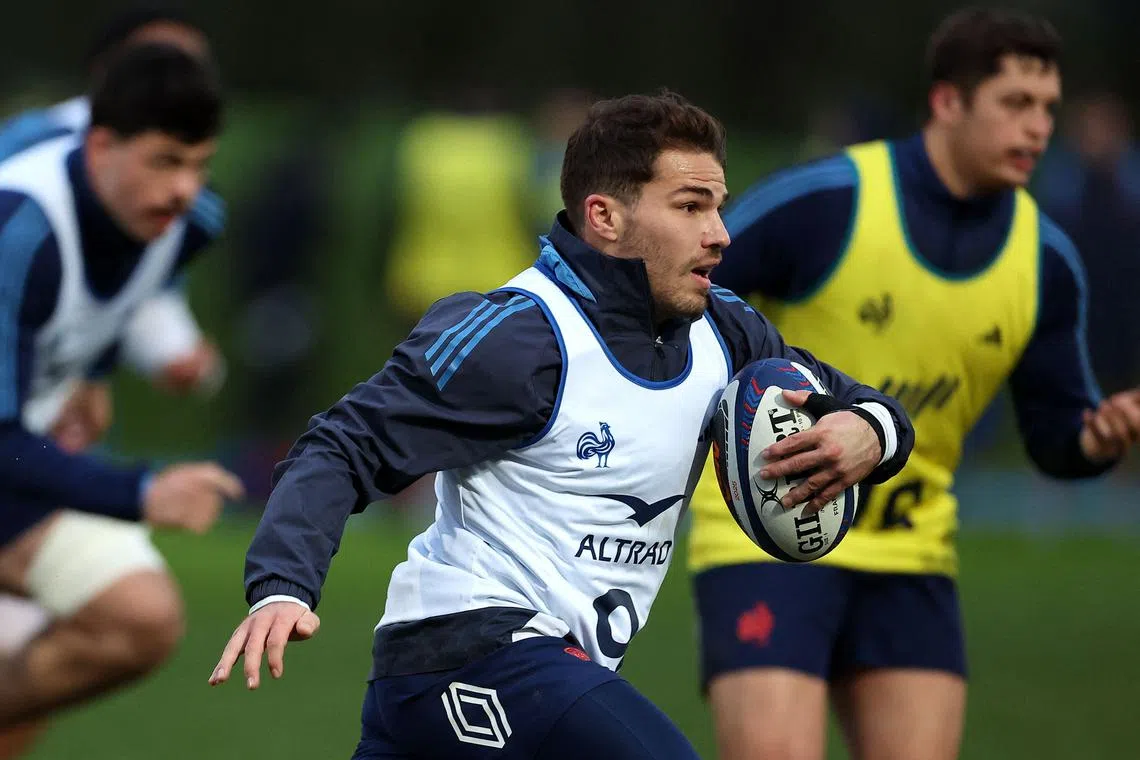 France scrum-half Antoine Dupont running with the ball during a training session in Marcoussis, south of Paris, on Jan 26 as part of preparations for the Six Nations rugby union match between France and Wales and Jan 31.