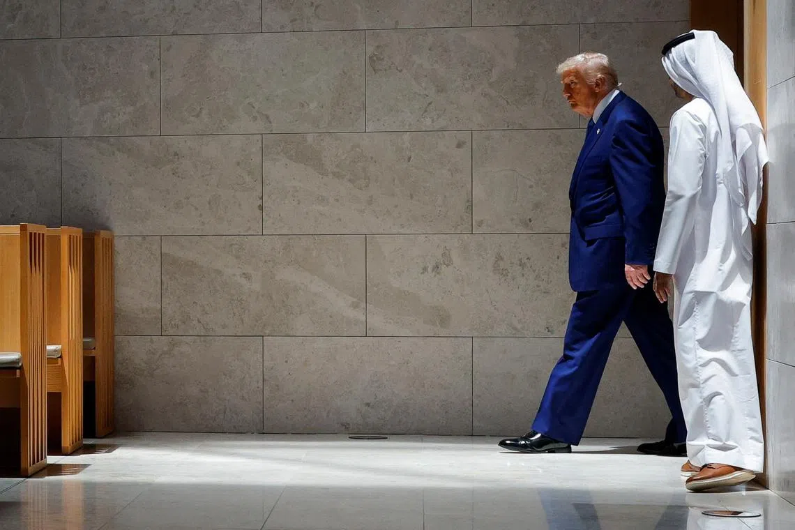U.S. President Donald Trump visits Moses Ben Maimon Synagogue at the Abrahamic Family House during the final stop of his Gulf visit, in Abu Dhabi, United Arab Emirates, May 16, 2025. REUTERS/Brian Snyder
