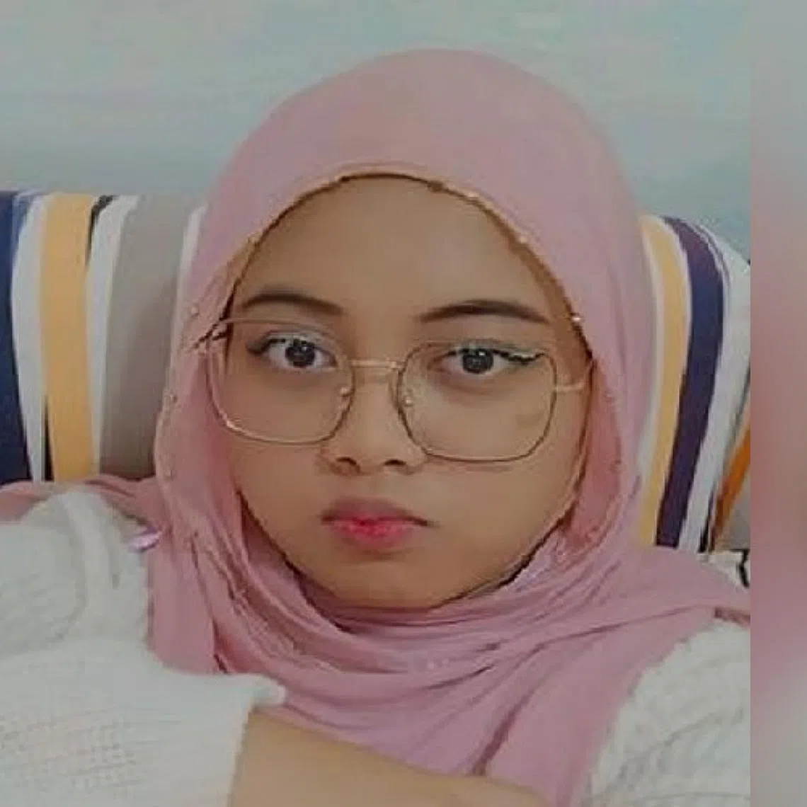 Rabiatul Adawiyah was last seen wearing a pink headscarf and a white long-sleeved shirt.