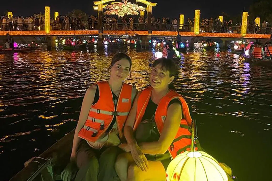 Former supermodel Pat Kraal (right) with her daughter April in Hoi An, Vietnam. 