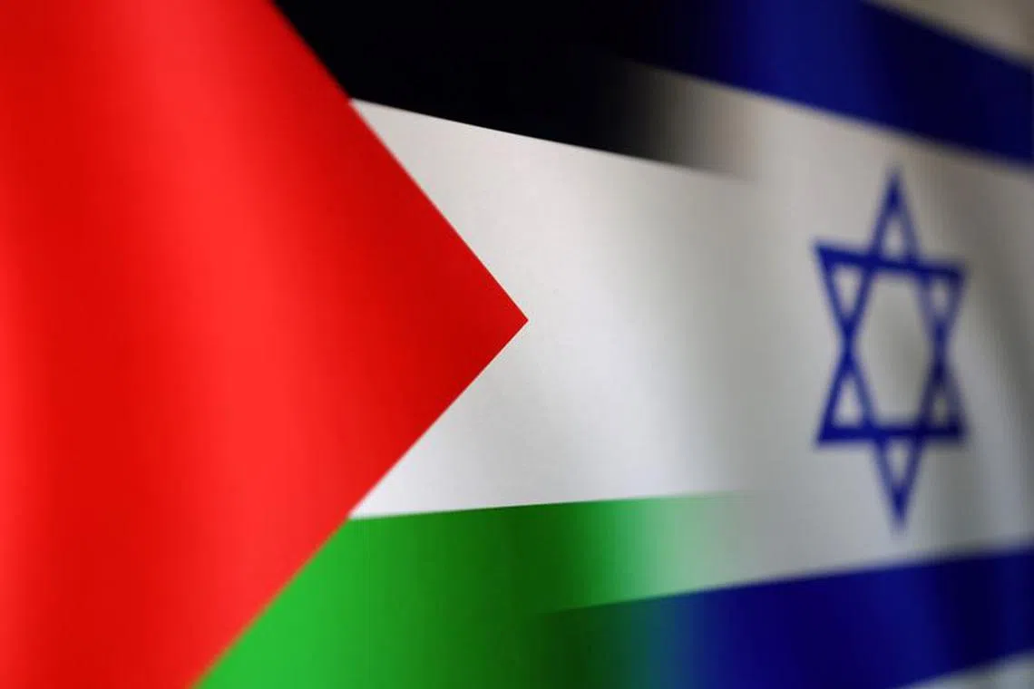 FILE PHOTO: Palestinian and Israel flags are seen in this illustration taken, October 15, 2023. REUTERS/Dado Ruvic/Illustration/File photo