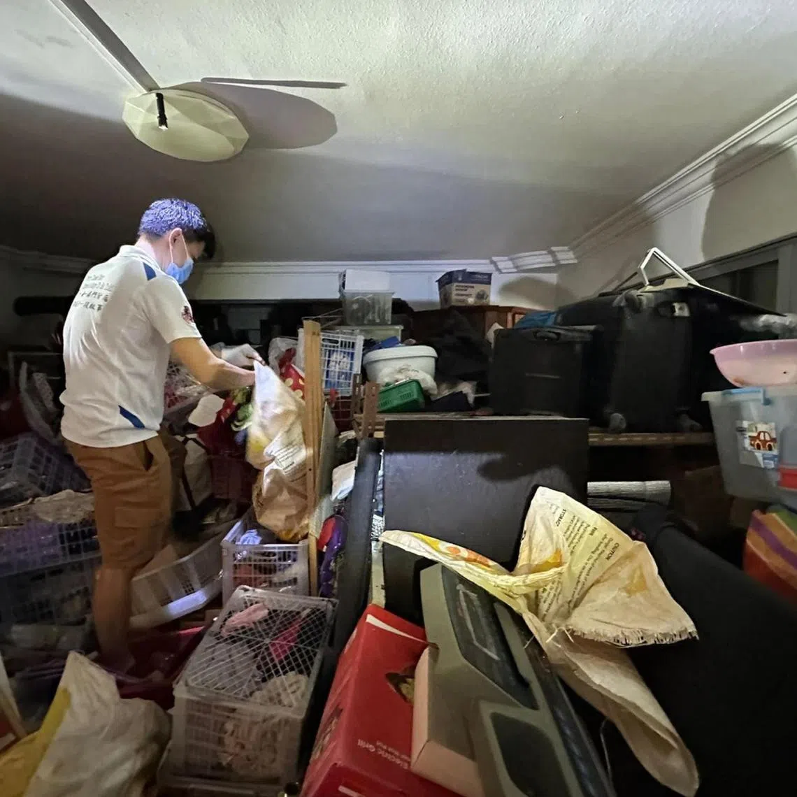A hoarder's flat in Pasir Ris that volunteers helped to declutter on Jan 5.