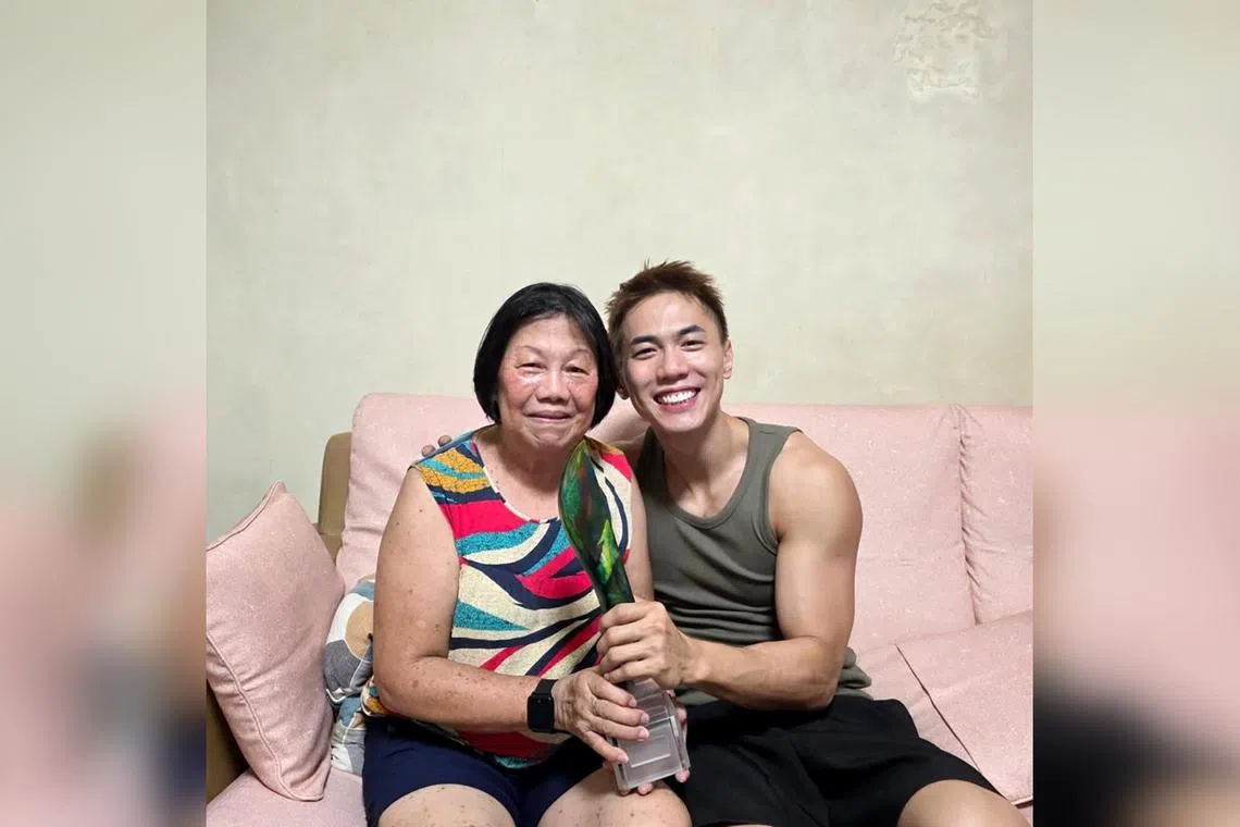 Nick Teo shared on social media on May 10 a photo of himself and his mother holding his Star Awards trophy. 