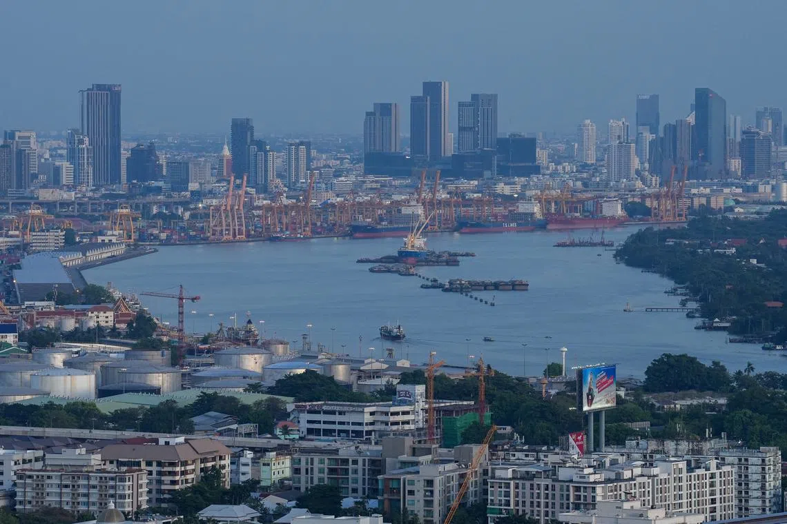 A view of Bangkok's port along Chao Phraya River is photographed during sunset in Bangkok, Thailand, January 4, 2023. REUTERS/Athit Perawongmetha/File Photo