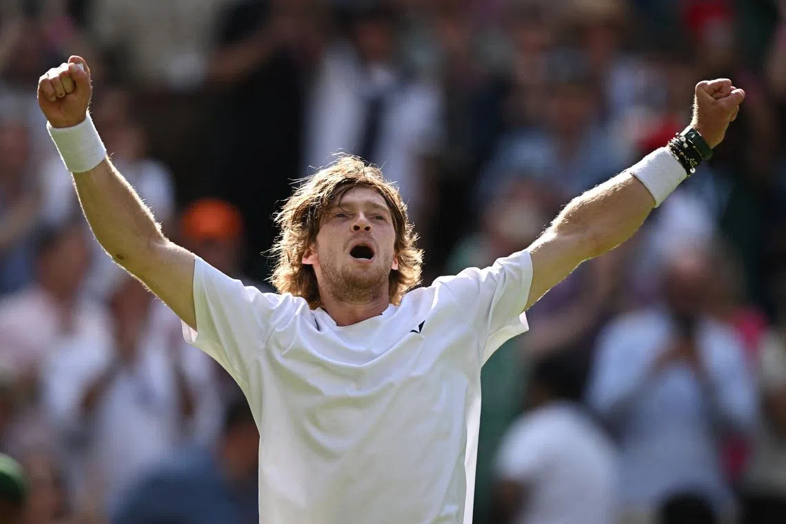 Russia's Andrey Rublev celebrates after winning his fourth round match against Kazakhstan's Alexander Bublik.