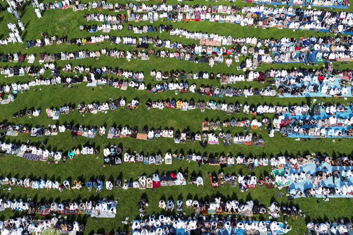 Muslims attending Eid Al-Adha prayers, marking the Festival of Sacrifice, at Platt Fields Park, in Manchester, Britain, on May 27, 2026. 