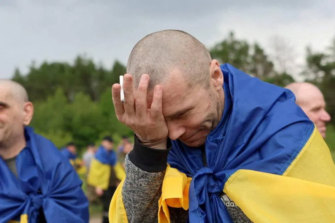A Ukrainian prisoner of war (POW) reacts after a swap, amid Russia's attack on Ukraine, at an unknown location in Ukraine, June 19, 2025. Ukrainian Presidential Press Service/Handout via REUTERS