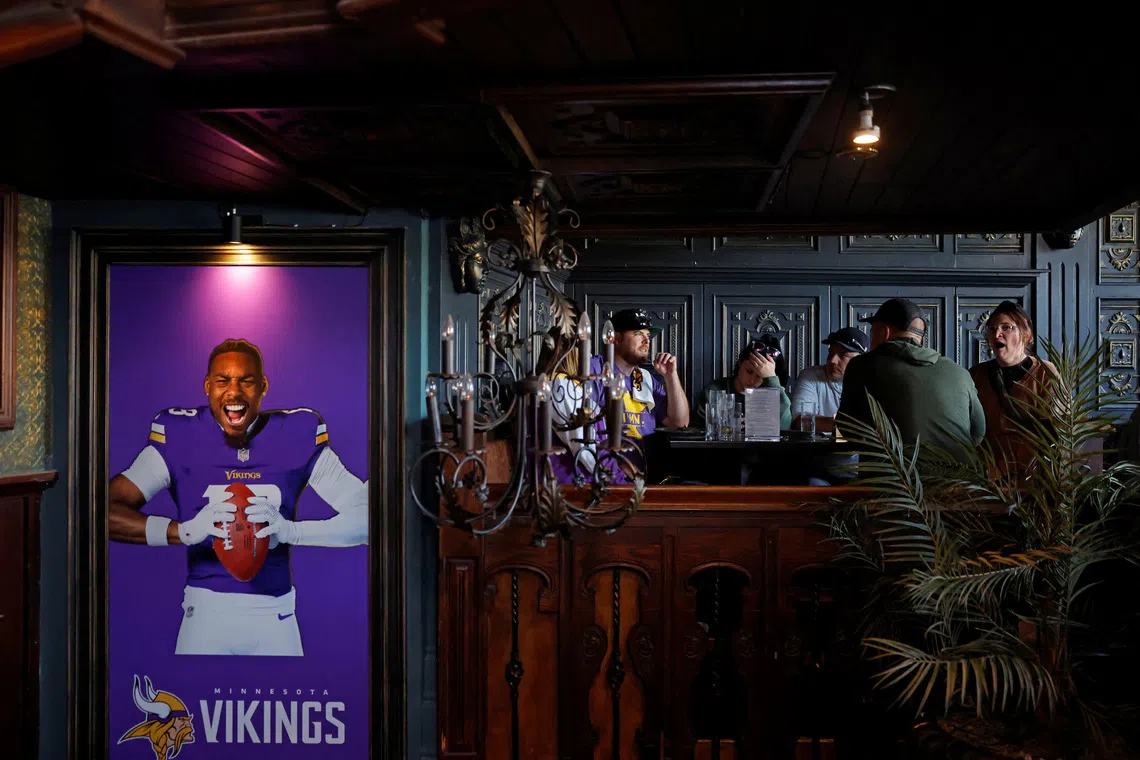 American football Vikings fans enjoy themselves in a pub ahead of the NFL's first-ever Irish regular-season game with Pittsburgh Steelers versus Minnesota Vikings to play in Croke park, in Dublin, Ireland September 26, 2025. REUTERS/Clodagh Kilcoyne