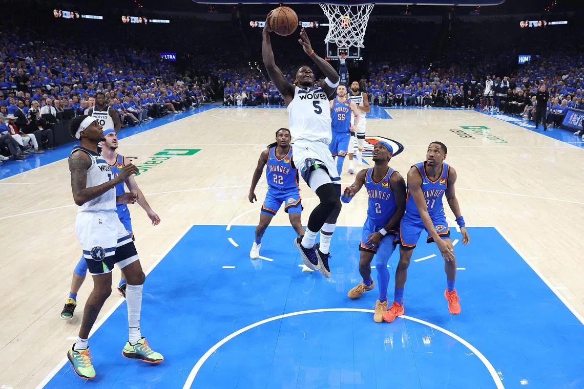 Anthony Edwards of the Minnesota Timberwolves shoots a lay up against the Oklahoma City Thunder in Game 2 of the Western Conference Finals.