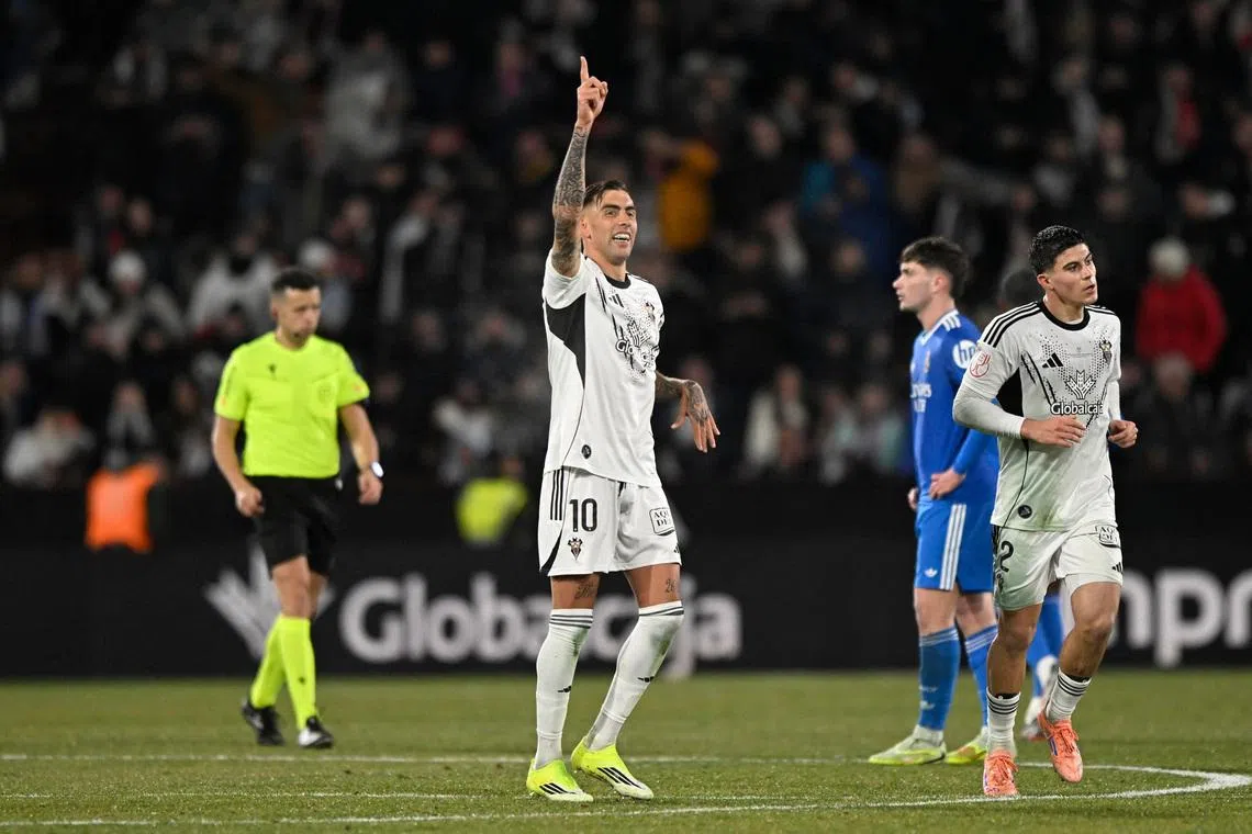 Soccer Football - Copa del Rey - Round of 16 - Albacete v Real Madrid - Estadio Carlos Belmonte, Albacete, Spain - January 14, 2026 Albacete's Jefte celebrates scoring their second goal. REUTERS/Pablo Morano